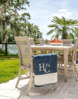 gray teak and rope chairs